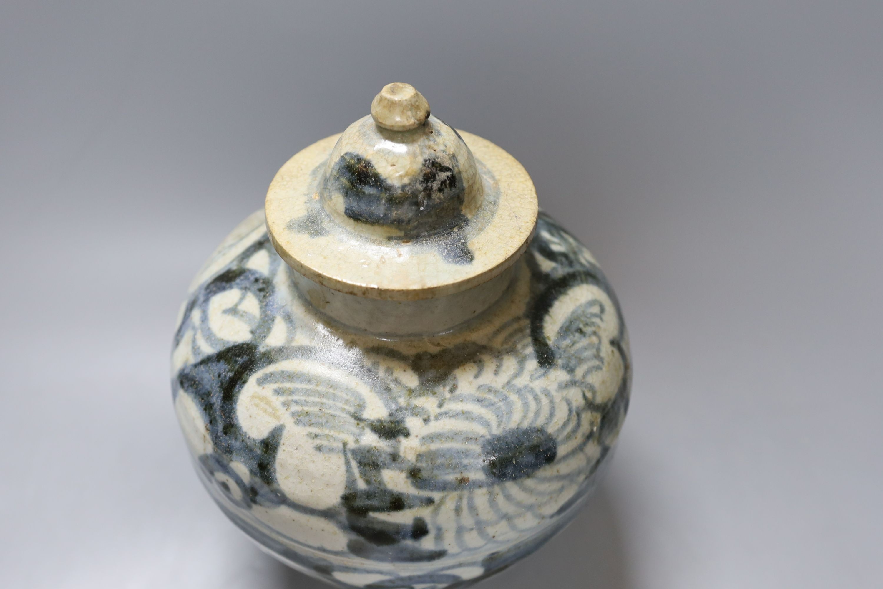 A South East Asian blue and white porcelain jar and cover, possibly Sawankhalok 26cm